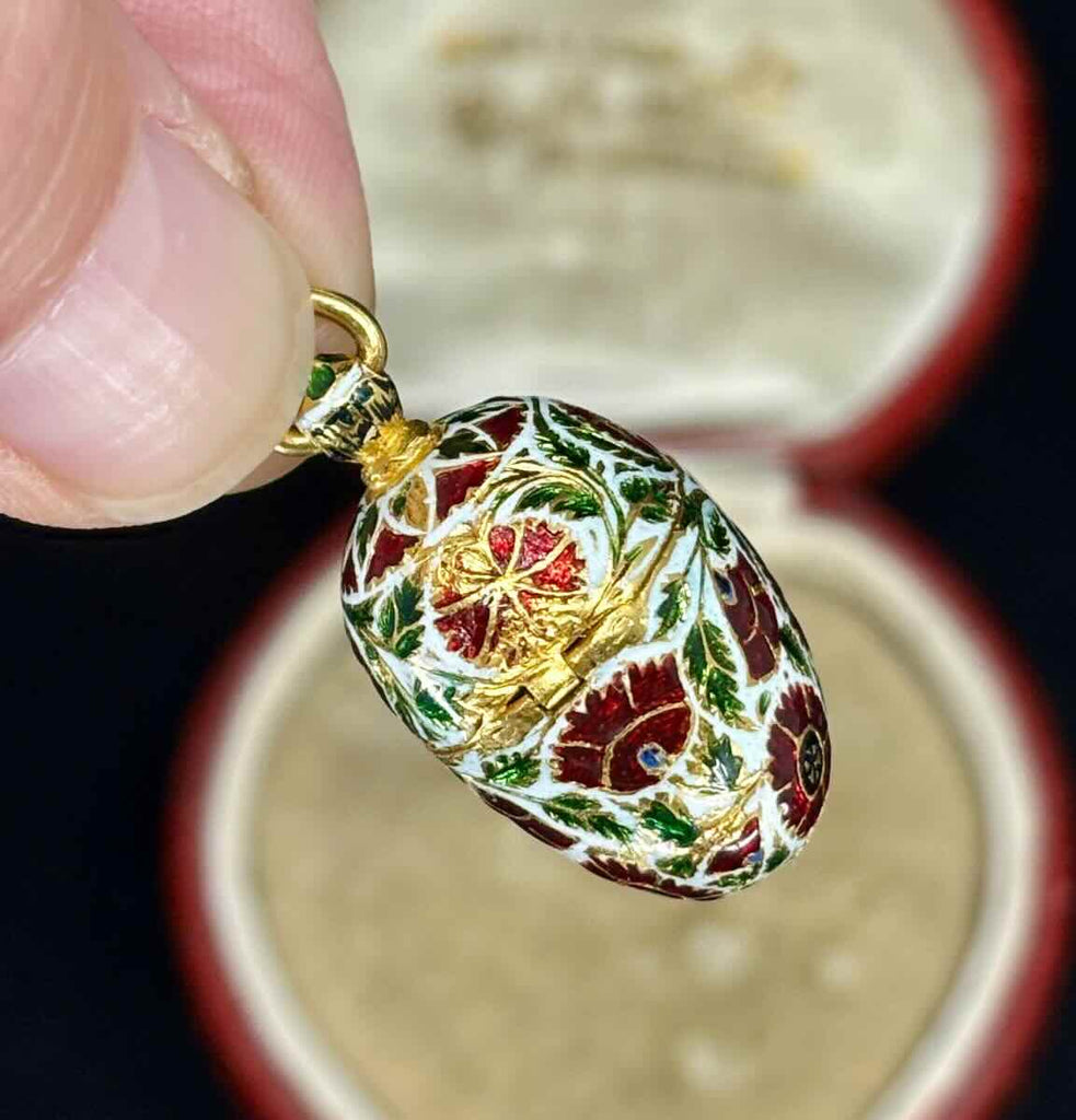 Mango-shaped antique pomander pendant in 22ct yellow gold with elaborate floral enamel and original hinged opening.