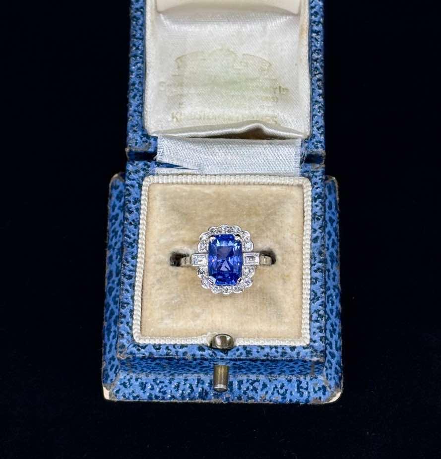 Elegant 18ct white gold ring showcasing a natural untreated Ceylon sapphire with diamond details.