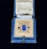 Elegant 18ct white gold ring showcasing a natural untreated Ceylon sapphire with diamond details.