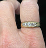 Victorian old cut diamond half hoop ring shown on finger
