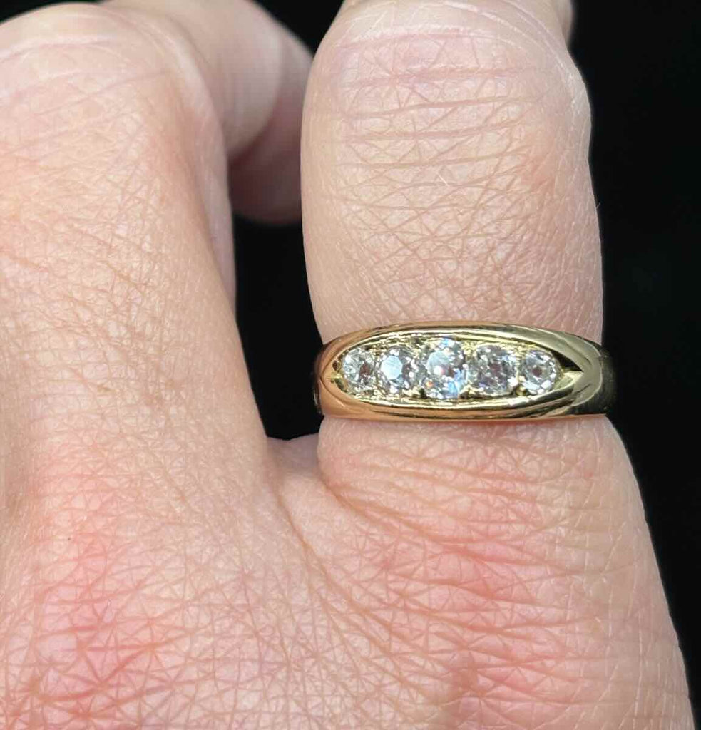 Victorian old cut diamond half hoop ring shown on finger