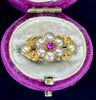 Romantic Victorian jewellery featuring a ruby and pearl arrangement.