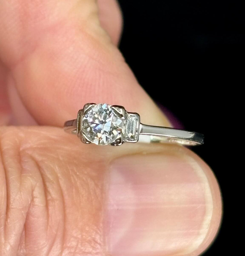  Platinum ring with Old European cut diamond and baguette diamonds by Hardy Brothers.