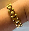 1940s Egyptian 18ct yellow gold hollow buckle link bracelet shown on wrist