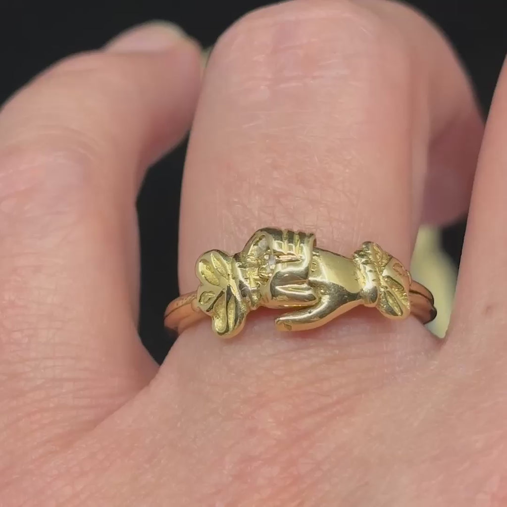 antique Georgian 18ct yellow gold fede gimmel ring worn on finger.