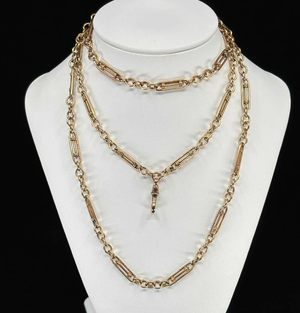 Rare Edwardian guard chain in 9ct yellow gold, 84cm long, close-up of the distinctive rare link and swivel clip in excellent original condition.