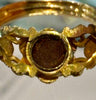 The underside of the Victorian ring setting revealing a secret locket compartment.