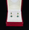 Sophisticated jewellery with emerald and diamond design.