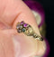 Victorian era jewelry featuring a Regard ring with symbolic gemstones and Fede motif.