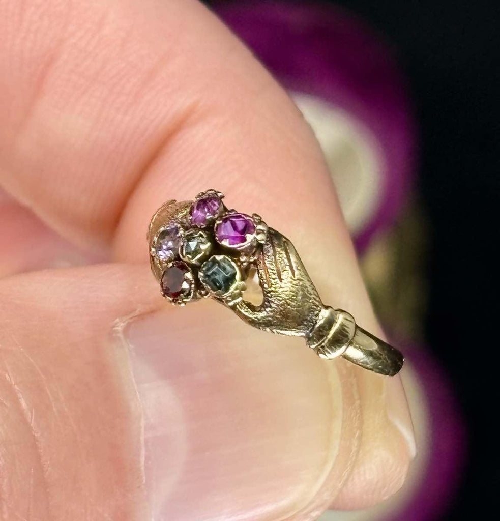 Victorian era jewelry featuring a Regard ring with symbolic gemstones and Fede motif.