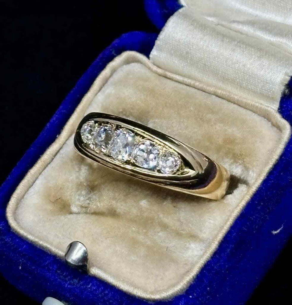 Victorian gold diamond half hoop ring in yellow gold on a side view