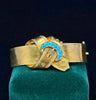 Oval Victorian gold buckle bracelet set with robin egg blue turquoise cabochons dating to circa 1860