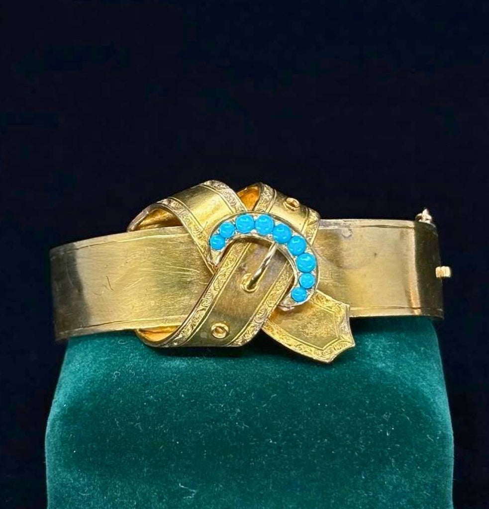 Oval Victorian gold buckle bracelet set with robin egg blue turquoise cabochons dating to circa 1860