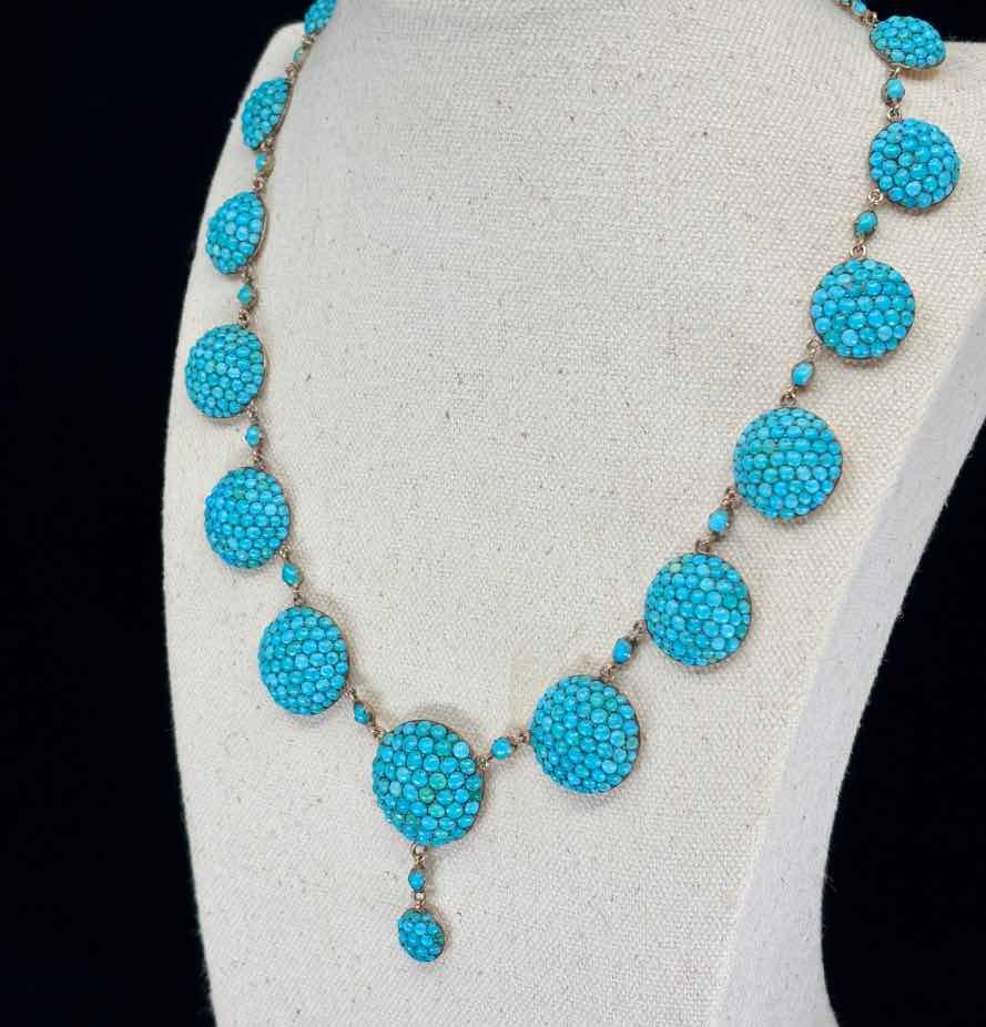 Side view of a Victorian turquoise necklace showcasing graduated round domed links in mint condition.