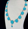 Side view of a Victorian turquoise necklace showcasing graduated round domed links in mint condition.
