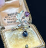Vintage 1910 Russian Art Nouveau ring showcasing flowing botanical motifs and mixed gemstones—perfect collectible antique jewel.