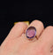 Handmade 14ct rose gold amethyst ring from the 1920s, highlighting exquisite craftsmanship.