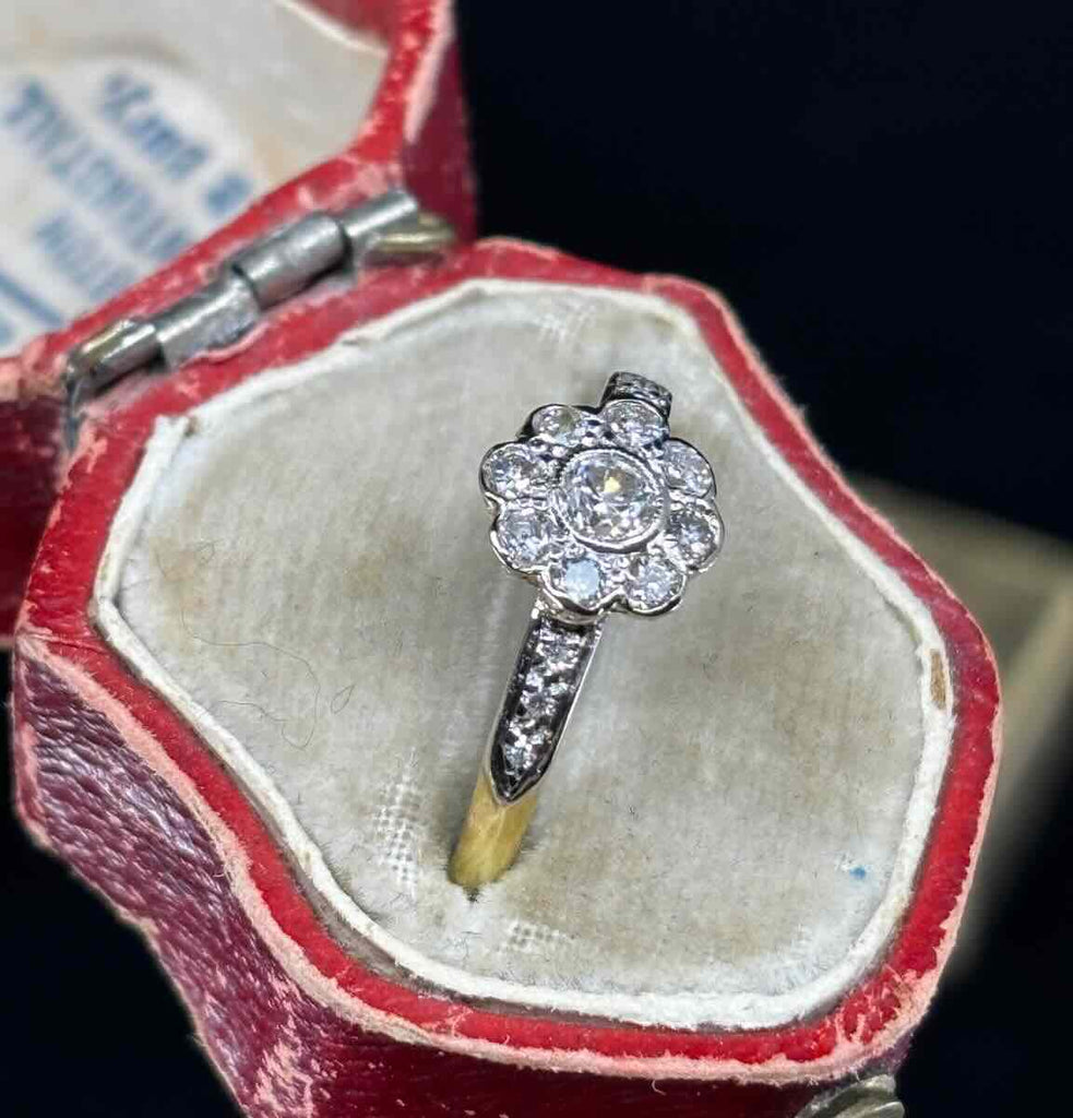 Vintage 1920s posy cluster engagement ring side view highlighting contrasting 18ct white top and yellow gold band