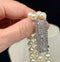 Close-up of diamond clasp on Art Deco pearl necklace from the 1920s.