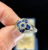 vintage Ceylon sapphire cluster engagement ring with split shoulders to a 1.80mm band.
