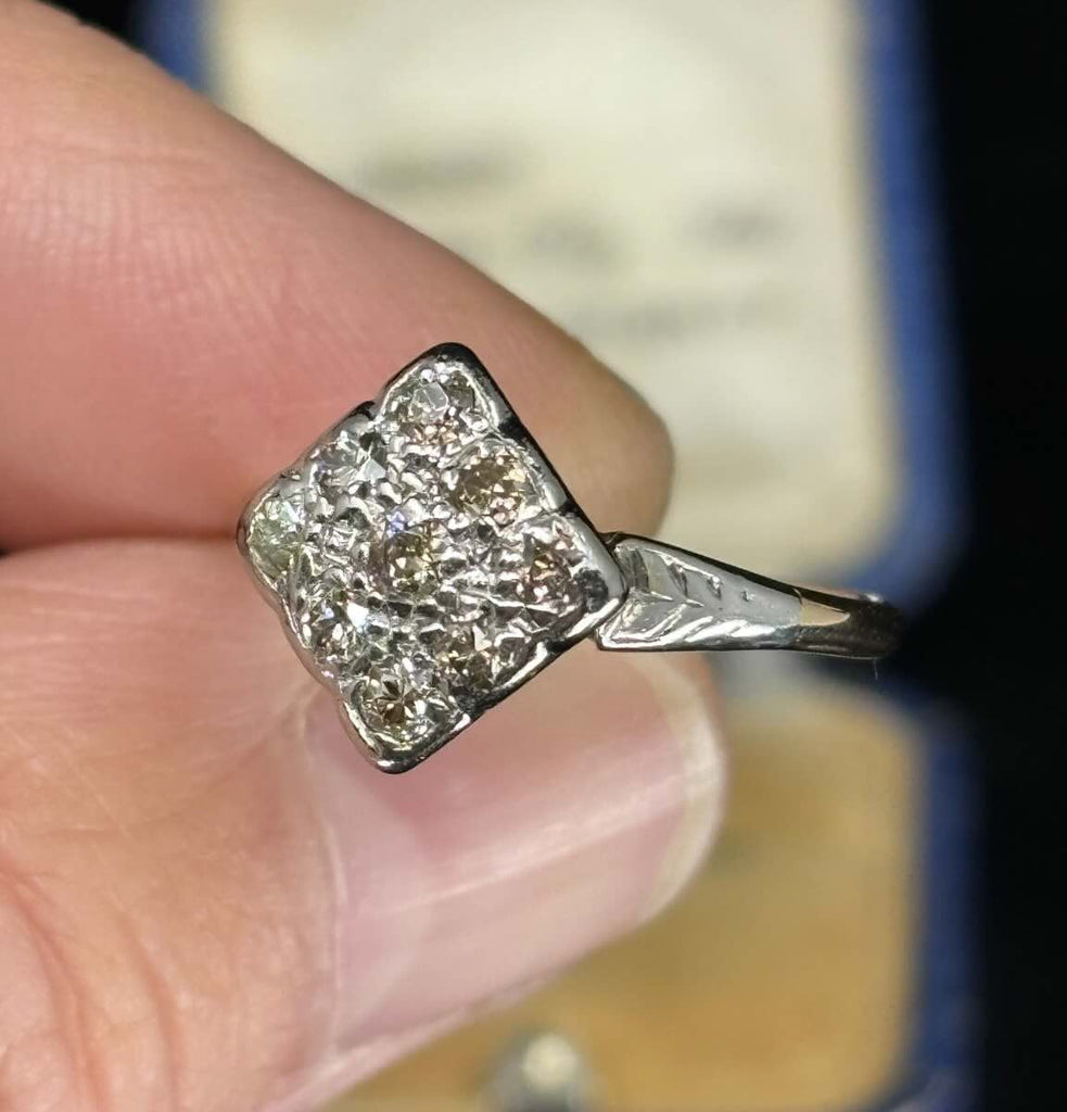 Vintage Diamond Cluster Ring featuring European design elements from the 1920s, perfect for collectors.