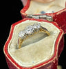 Vintage three-stone diamond ring set in platinum with 18ct yellow gold shank, approx. 0.30ct centre and 0.22ct sides.